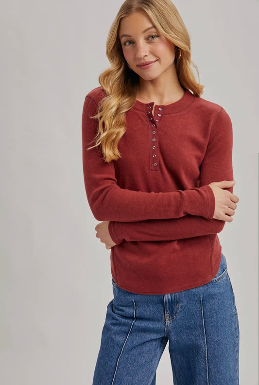 Henley Snap Button Front Dolphin Hem Knit Top