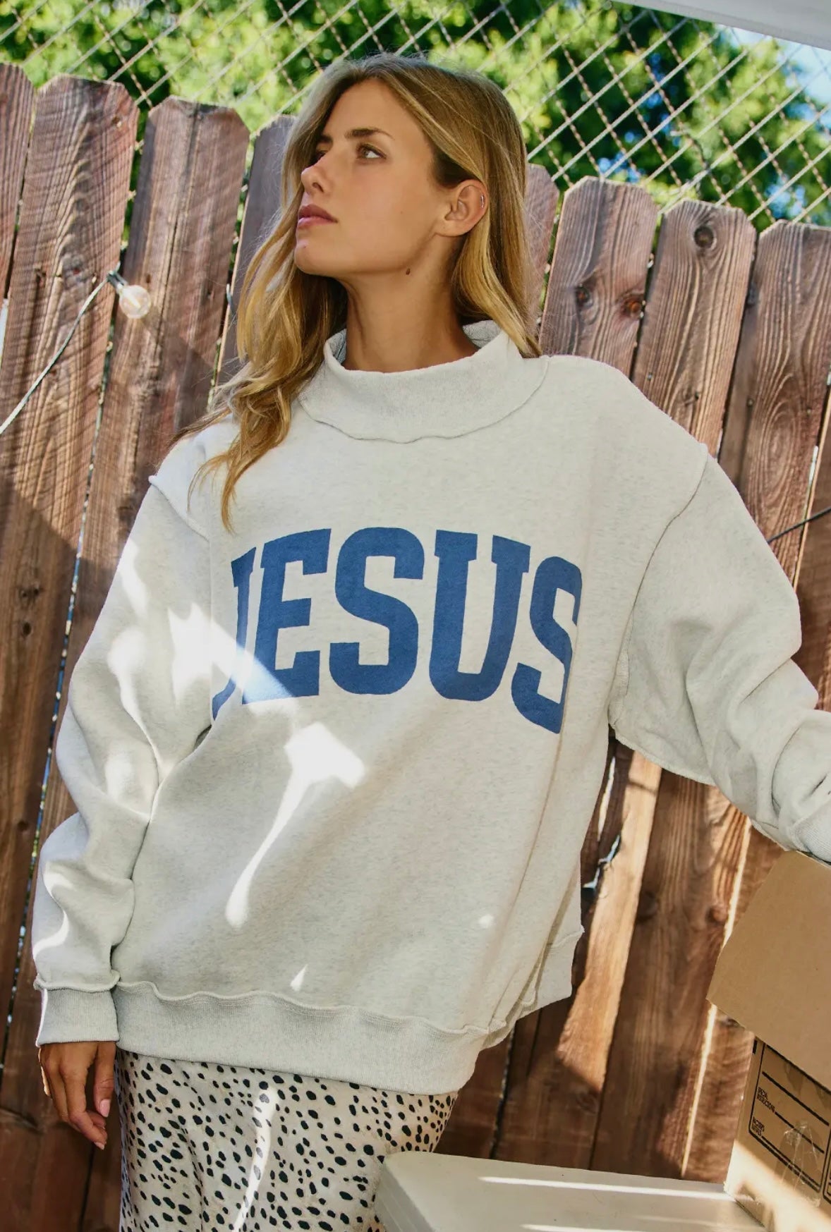 Jesus and God Is Good reversible mock neck sweatshirt